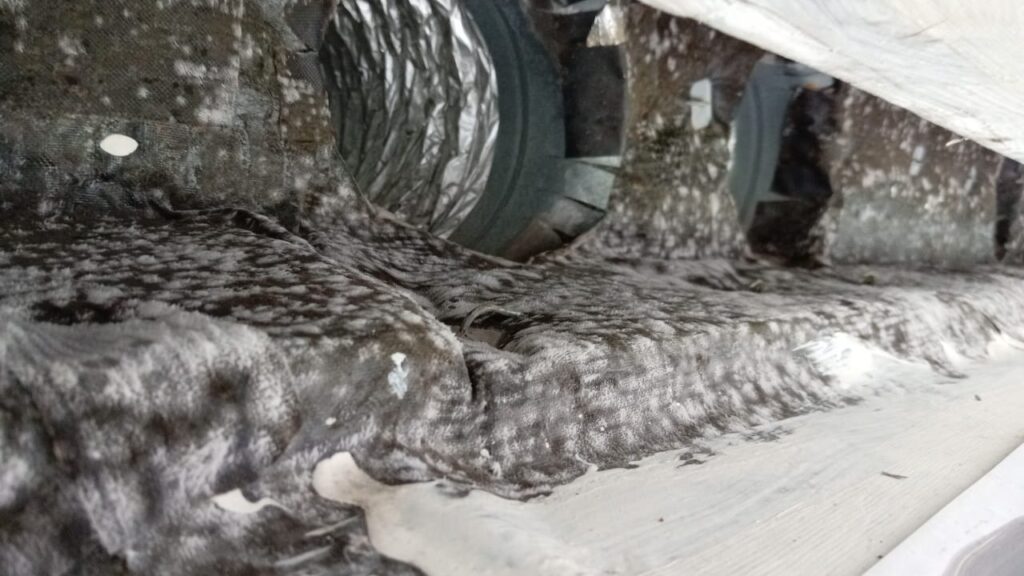 Professional AC duct cleaning service removing dust and debris for cleaner, healthier indoor air.